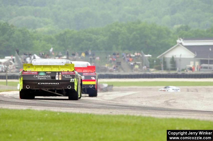 Ty Dillon's Chevy Camaro ahead of Justin Marks' Chevy Camaro