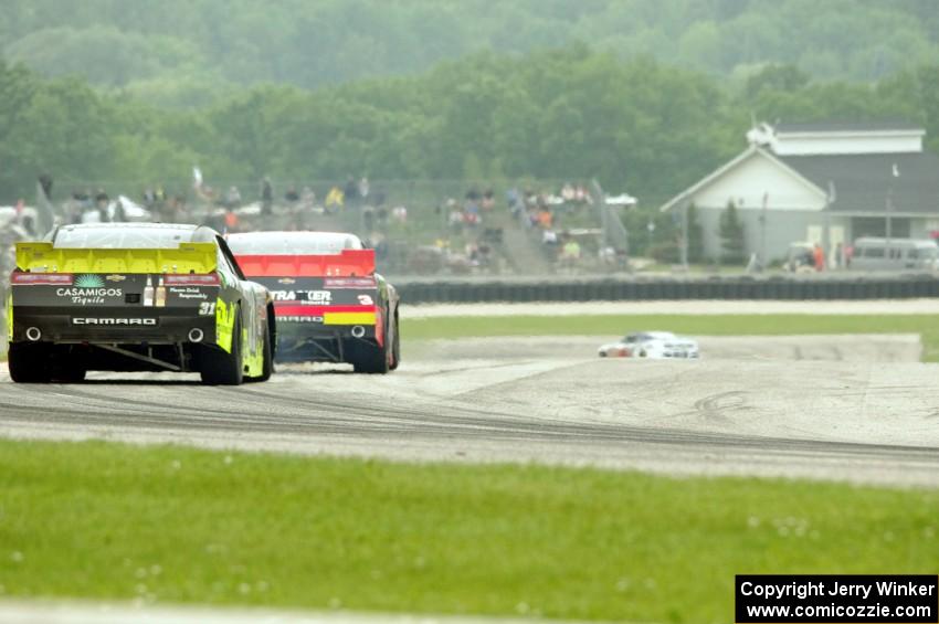 Ty Dillon's Chevy Camaro ahead of Justin Marks' Chevy Camaro