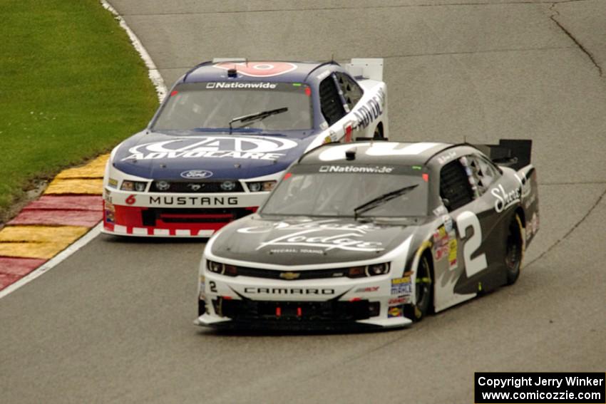 Brian Scott's Chevy Camaro and Trevor Bayne's Ford Mustang