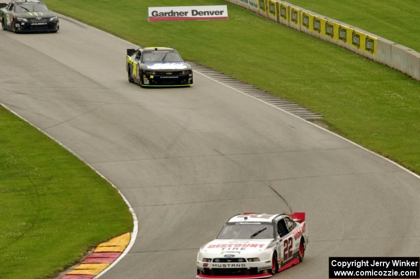 Alex Tagliani's Dodge Challenger, Bobby Reuse's Chevy Camaro and Sam Hornish, Jr.'s Toyota Camry