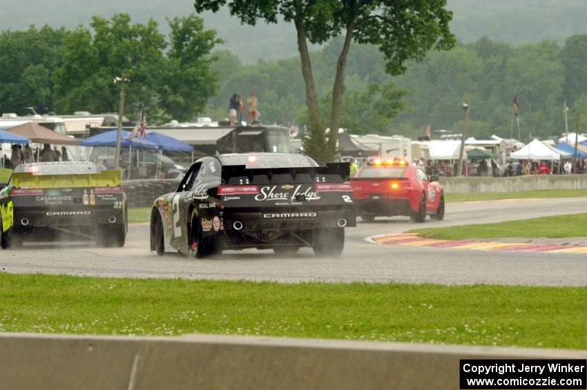 Justin Marks' Chevy Camaro and Brian Scott's Chevy Camaro behind the pace car