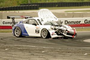 Javier Quiros' Porsche GT3 Cup spins and stalls at turn 8 on the first lap.