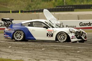 Javier Quiros' Porsche GT3 Cup spins and stalls at turn 8 on the first lap.