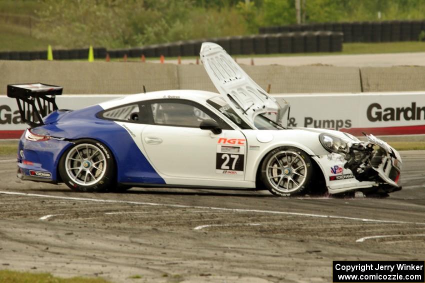 Javier Quiros' Porsche GT3 Cup spins and stalls at turn 8 on the first lap.