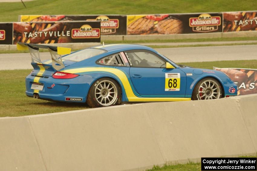 Wayne Ducote's Porsche GT3 Cup pulls off course just after turn 8.