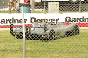Richard Fant's Panoz Élan DP-02 comes to a stop at turn one.