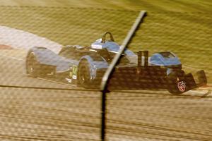 Matt McMurry's Panoz Élan DP-02 loses the wing headed into turn one.