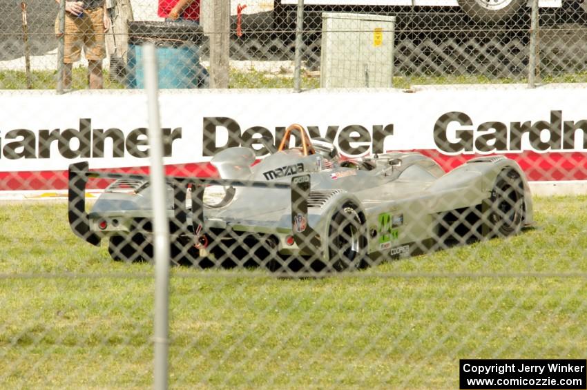 Richard Fant's Panoz Élan DP-02 comes to a stop at turn one.