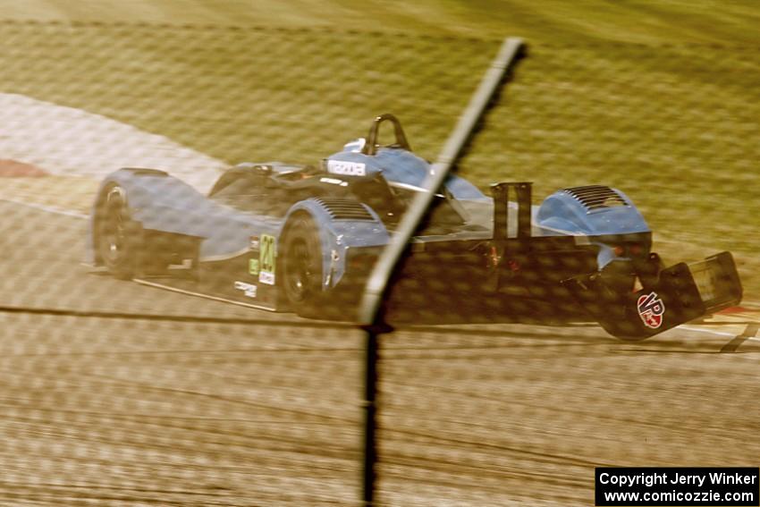 Matt McMurry's Panoz Élan DP-02 loses the wing headed into turn one.