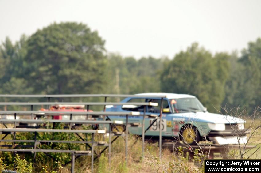 Fart-Hinder SAAB 900S heads back to the paddock on the tilt-bed