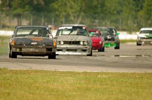 Flying Dutchmen Porsche 914, Brainerd Bombers Racing BMW 328, MiElan Mazda Miata and 365Racing Tuna No Crust BMW 325i