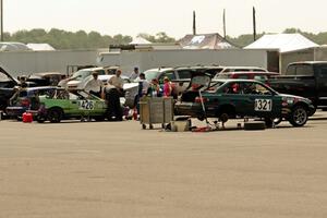 Danger Zone Racing Honda CRX In The Red BMW 325is in the paddock early on during Saturday's race.