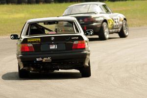 MKRacing BMW 328i chases the Team Party Cat Mazda Miata