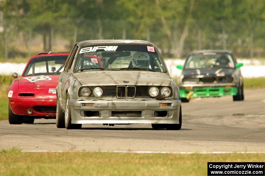 Brainerd Bombers Racing BMW 328, MiElan Mazda Miata and 365Racing Tuna No Crust BMW 325i