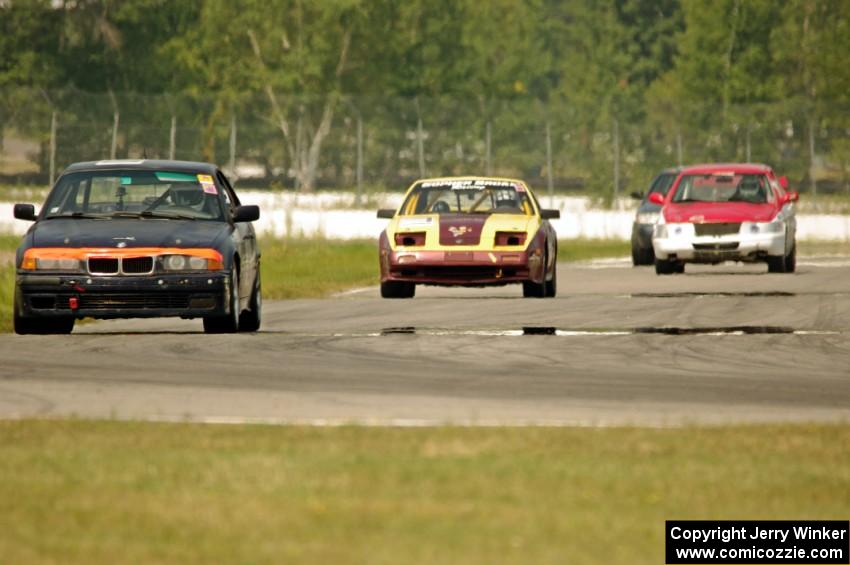 North Loop Motorsports 1 BMW 325, Gopher Broke Racing Nissan 300ZX, Fart-Kontrol SAAB 9-3 and Moss Racing Ford Crown Victoria