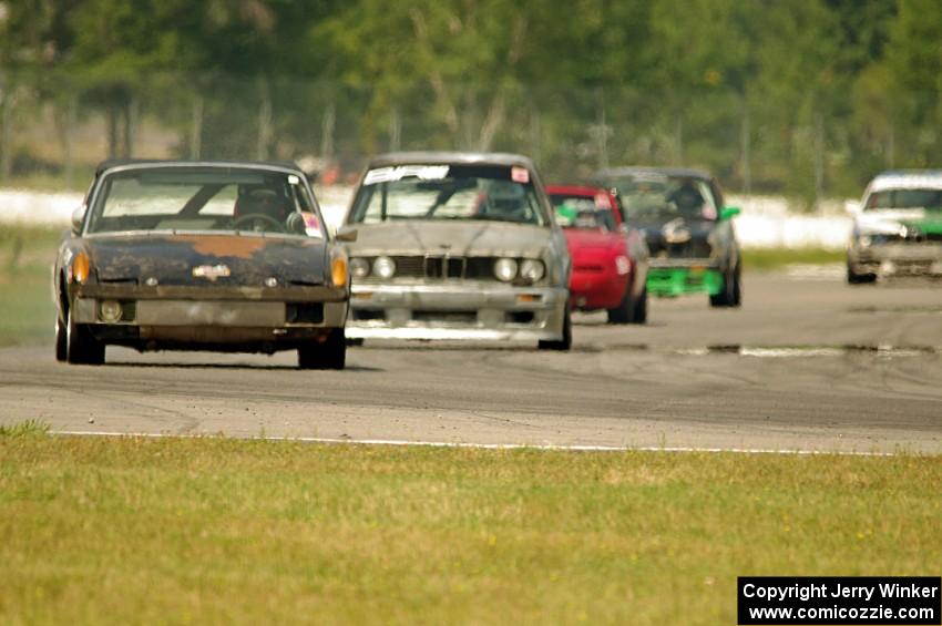 Flying Dutchmen Porsche 914, Brainerd Bombers Racing BMW 328, MiElan Mazda Miata and 365Racing Tuna No Crust BMW 325i