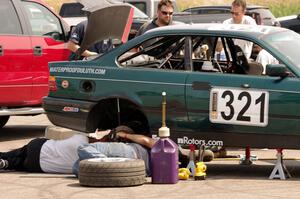 In The Red BMW 325is in the paddock during Saturday's race.