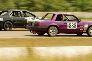 Purple-Headed Chumps Ford Mustang passes the JSK Racing Nissan Maxima