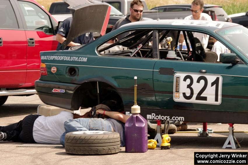 In The Red BMW 325is in the paddock during Saturday's race.