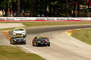 Chad Gilsinger / Michael Valiante Honda Civic, Remo Ruscitti / Adam Isman Porsche Cayman and Charles Espenlaub /Cameron Lawrence