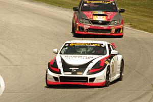 B.J. Zacharias / Brad Jaeger Nissan 370Z and Ray Mason / Pierre Kleinubing Subaru WRX STi