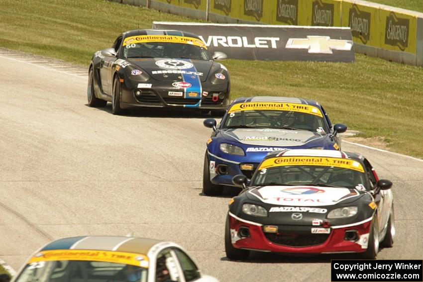 Tyler McQuarrie / Marc Miller and Stevan McAleer / Chad McCumbee Mazda MX-5s, and Cody Ellsworth / Corey Lewis Porsche Cayman