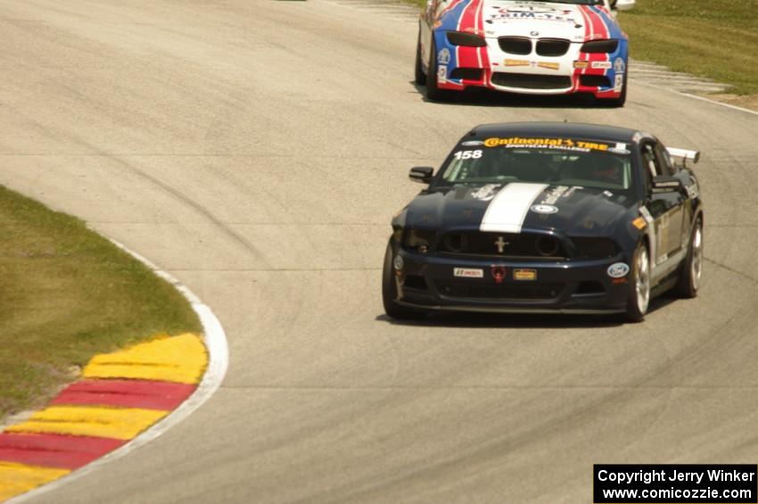 Ian James / Billy Johnson Ford Mustang Boss 302R and Trent Hindman / John Edwards BMW M3