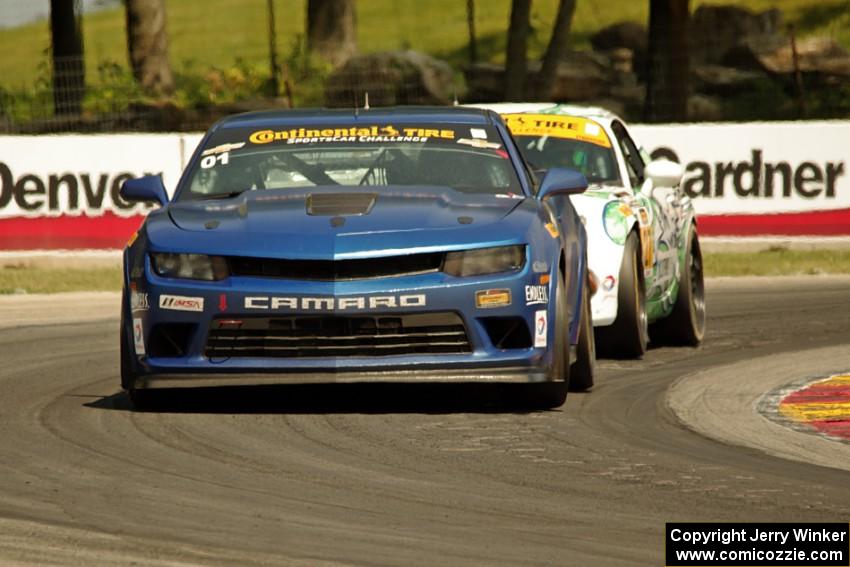 Eric Curran / Lawson Aschenbach Chevy Camaro Z/28.R and Britt Casey, Jr. / Mark White Mazda MX-5