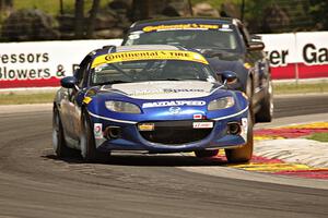 Stevan McAleer / Chad McCumbee Mazda MX-5 and Jade Buford / Scott Maxwell Ford Mustang Boss 302R