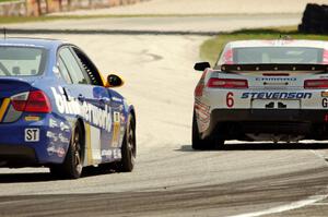 Robin Liddell / Andrew Davis Chevy Camaro Z/28.R and Eric Zimmermann / Tyler Cooke BMW 328i