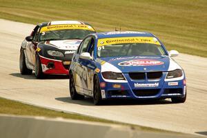 Greg Liefooghe / Tyler Cooke BMW 328i and Tyler McQuarrie / Marc Miller Mazda MX-5