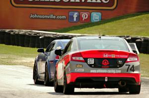 Eric Curran / Lawson Aschenbach Chevy Camaro Z/28.R and James Vance / Katherine Legge Honda Civic