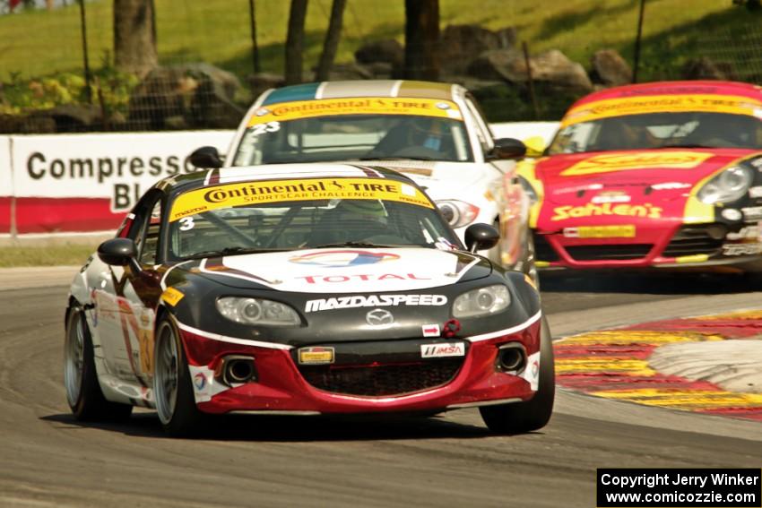 Tyler McQuarrie / Marc Miller Mazda MX-5 and Terry Borcheller / Mike LaMarra BMW 128i