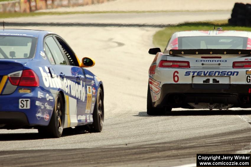 Robin Liddell / Andrew Davis Chevy Camaro Z/28.R and Eric Zimmermann / Tyler Cooke BMW 328i