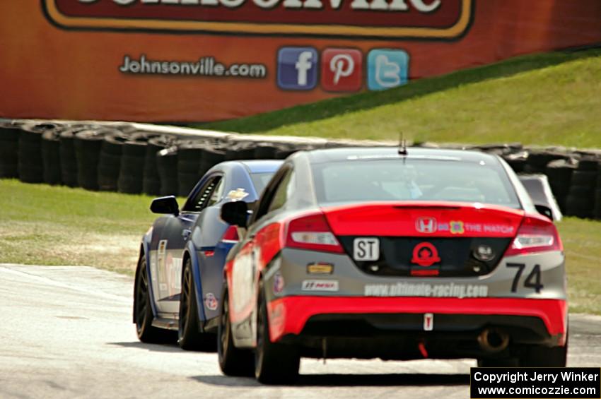 Eric Curran / Lawson Aschenbach Chevy Camaro Z/28.R and James Vance / Katherine Legge Honda Civic