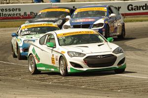 Charles Espenlaub / Cameron Lawrence Hyundai Genesis Coupe leads a pack of ST cars.