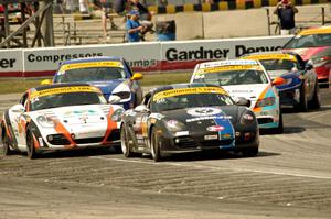 Cody Ellsworth / Corey Lewis Porsche Cayman leads ST late in the race.