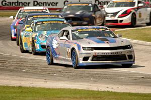 Andy Lally / Matt Bell Chevy Camaro Z/28.R leads into turn 8.