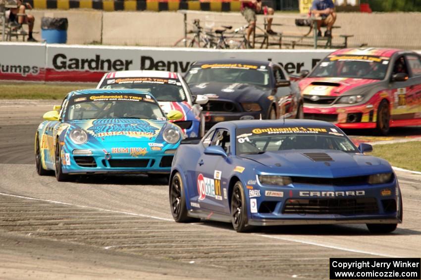 Eric Curran / Lawson Aschenbach Chevy Camaro Z/28.R grabs the lead late in the race.