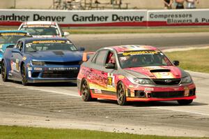 Ray Mason / Pierre Kleinubing Subaru WRX STi grabs the lead late in the race.