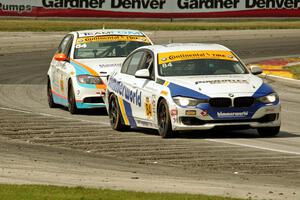 James Clay / Jason Briedis BMW 328i and Ted Giovanis / David Murry BMW 328i