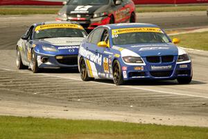 Eric Zimmermann / Tyler Cooke BMW 328i and Stevan McAleer / Chad McCumbee Mazda MX-5