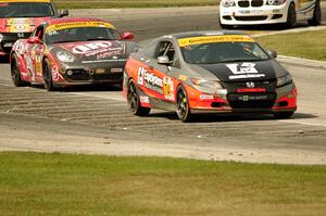 James Vance / Katherine Legge Honda Civic and Corey Fergus / Tom Dyer Porsche Cayman