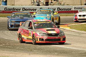 Ray Mason / Pierre Kleinubing Subaru WRX STi grabs the lead late in the race.