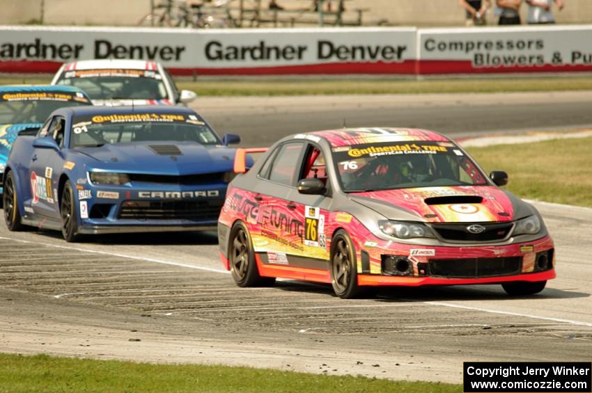 Ray Mason / Pierre Kleinubing Subaru WRX STi grabs the lead late in the race.