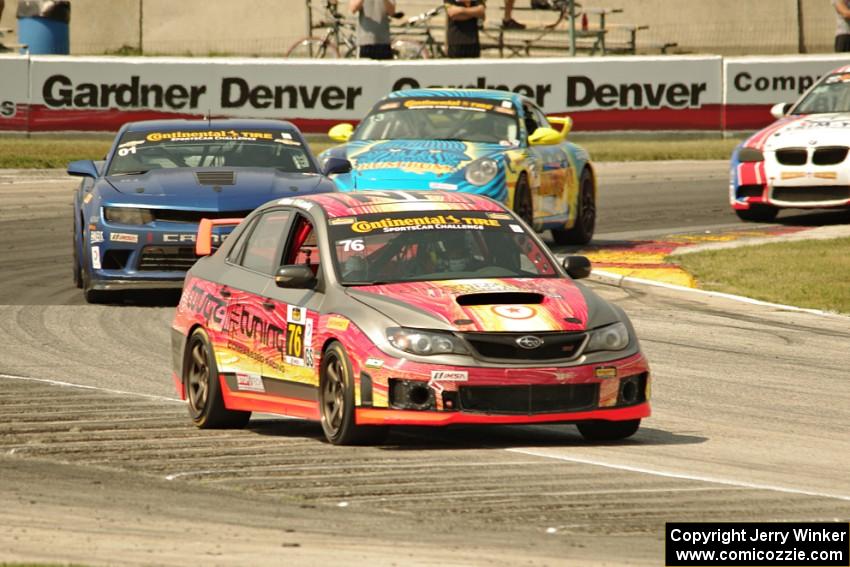 Ray Mason / Pierre Kleinubing Subaru WRX STi grabs the lead late in the race.