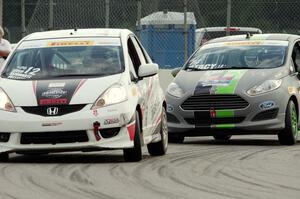 Johan Schwartz's Honda Fit and Nate Stacy's Ford Fiesta