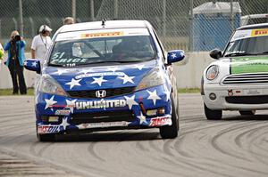 Brian Price's Honda Fit and Jason Fichter's MINI Cooper