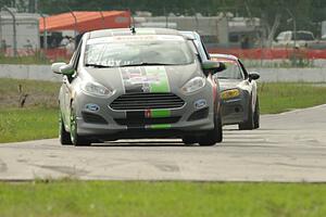 Nate Stacy's Ford Fiesta, Glenn Nixon's MINI Cooper and Jason Cherry's Mazda MX-5