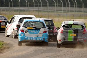 Johan Schwartz's Honda Fit, Glenn Nixon's MINI Cooper, Paul Holton's Honda Fit and Nate Stacy's Ford Fiesta